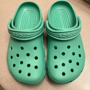 Teal colour Crocs size 7 women’s